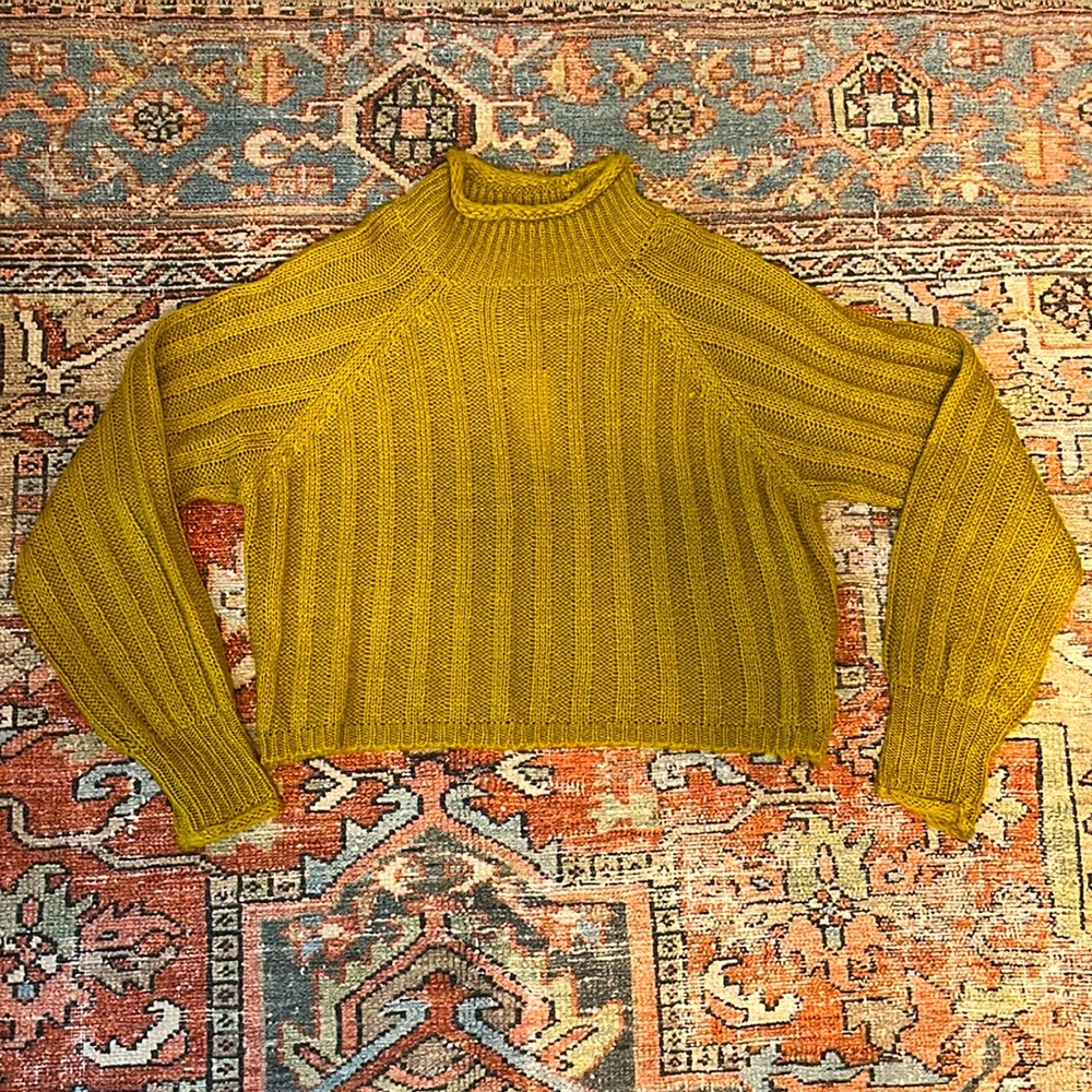 Mustard colored, rolled neck sweater. Size small. New with tags.